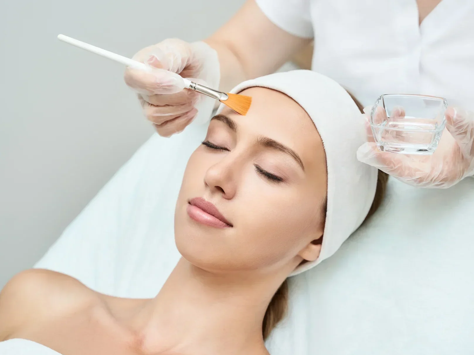 A chemical peel being applied by a doctor at The Aesthetic Edge, Bangalore